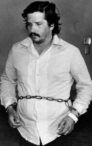 Photo of William 'Bill' Bonin, the Freeway Killer, in shackles during his first trial in Los Angeles. 
